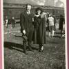 Waite Hoyt and wife at a train stop by what looks to be Mount Fuji.